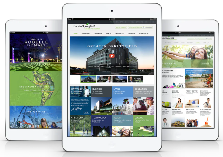 Three tablet devices displaying the Greater Springfield city website with navigation menus, hero images, video player, and content sections for commercial, education, health, technology, lifestyle ...
