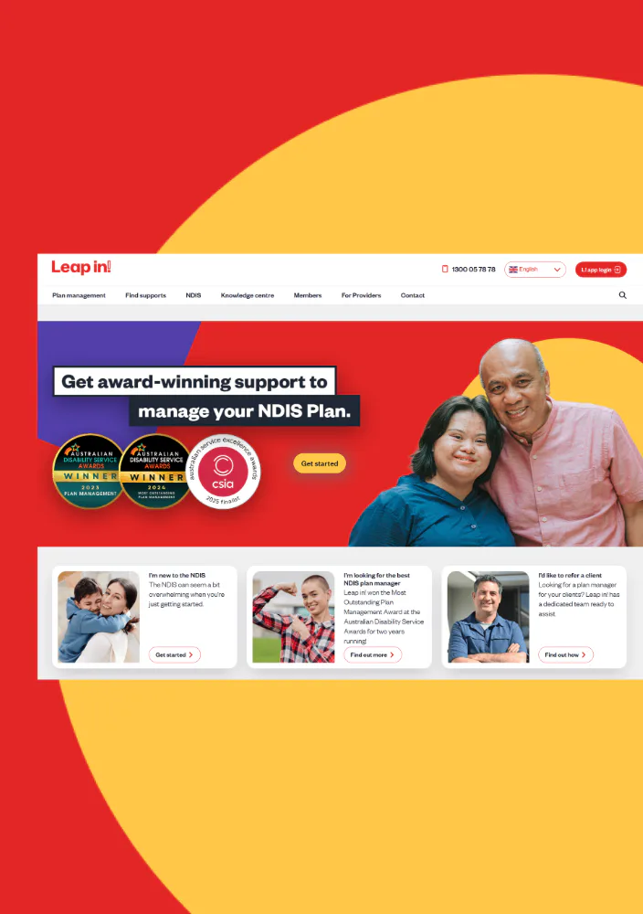 Leap In homepage showing a smiling man and woman with text 'Get award-winning support to manage your NDIS Plan' and three award badges including Australian Disability Services Awards